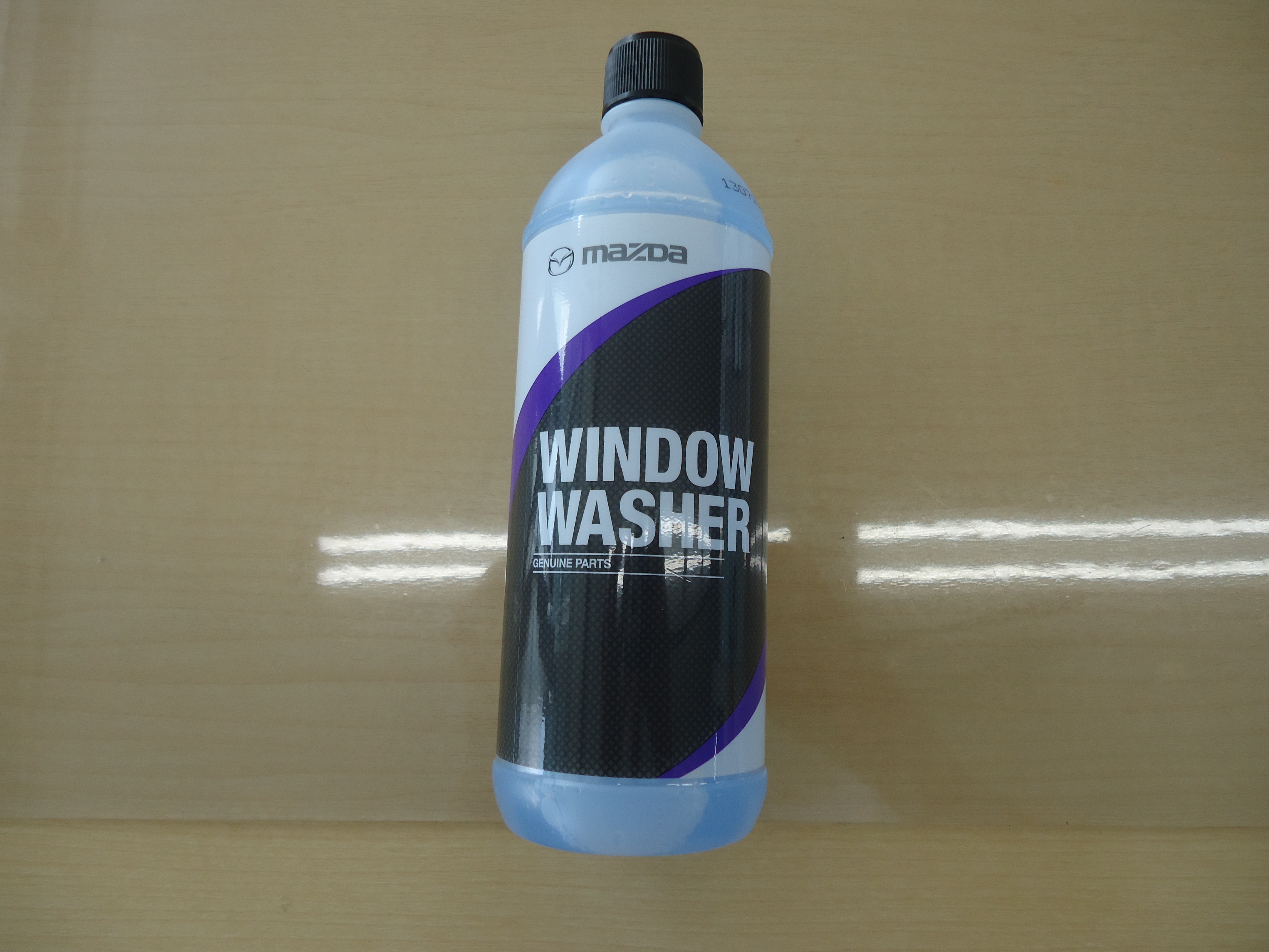 マツダ純正　ウォッシャー液です。